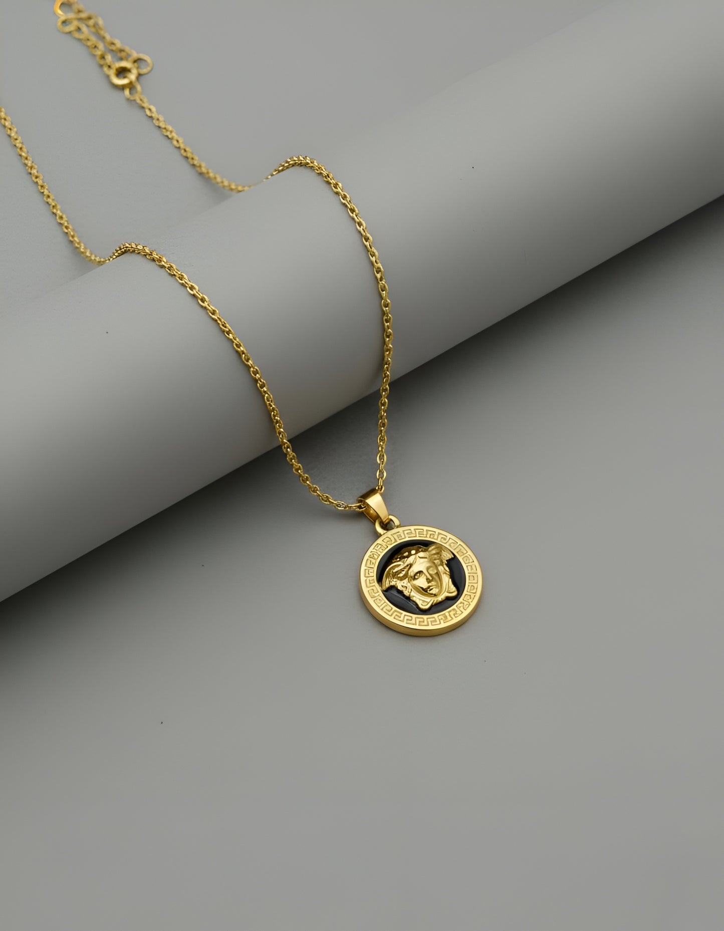 Stainless Steel Gold Plated Verse Black Pendant and Studs