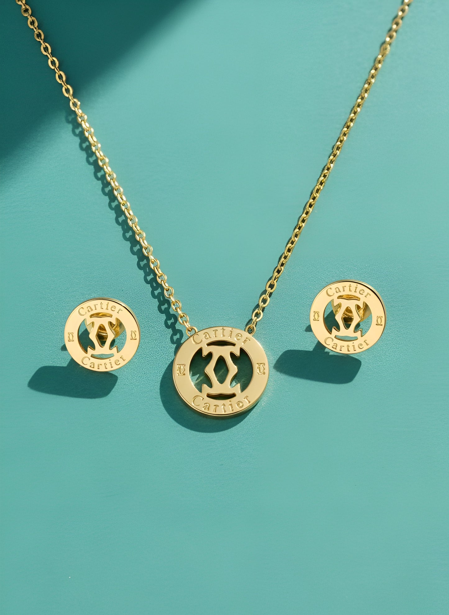 Stainless steel Cartier Circular Studs and Pendant