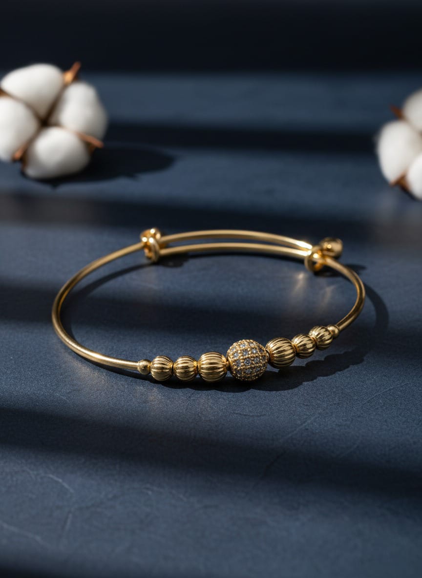 Adjustable Gold-Toned Bangle with Sparkling Pave Bead