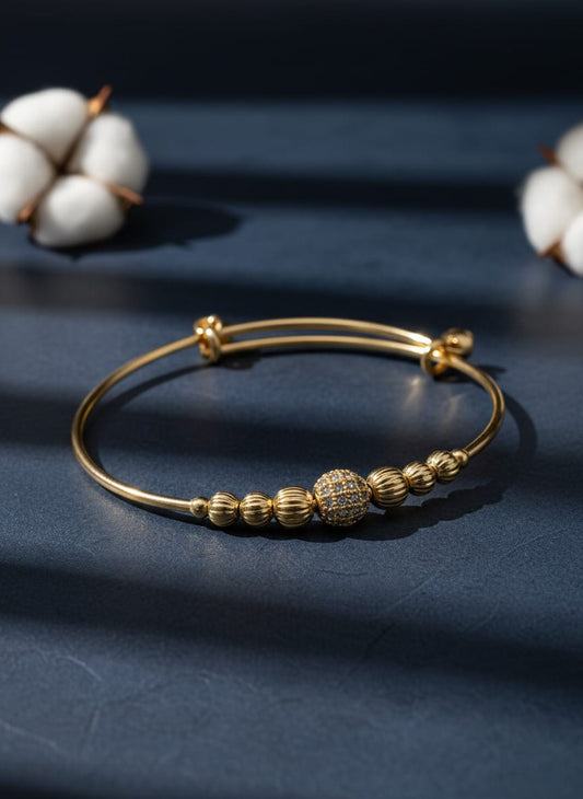 Adjustable Gold-Toned Bangle with Sparkling Pave Bead